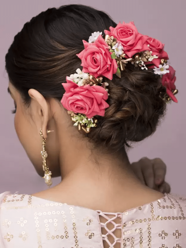 Types of Flowers For Your Bridal Hairstyle- Messy Bun with Flowers