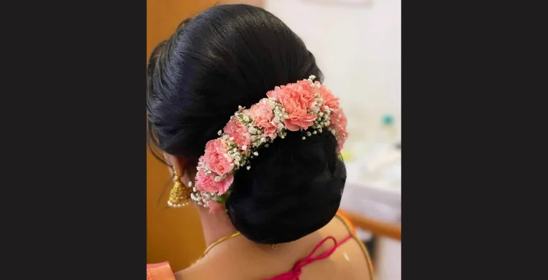 Engagement Hairstyle for Bride - Classic Bun with Fresh Flowers